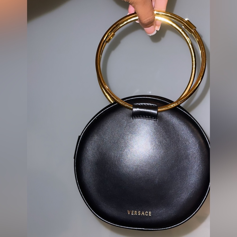 Versace clutch! Good condition! No strap! AUTHENTIC. Super cute handbag!